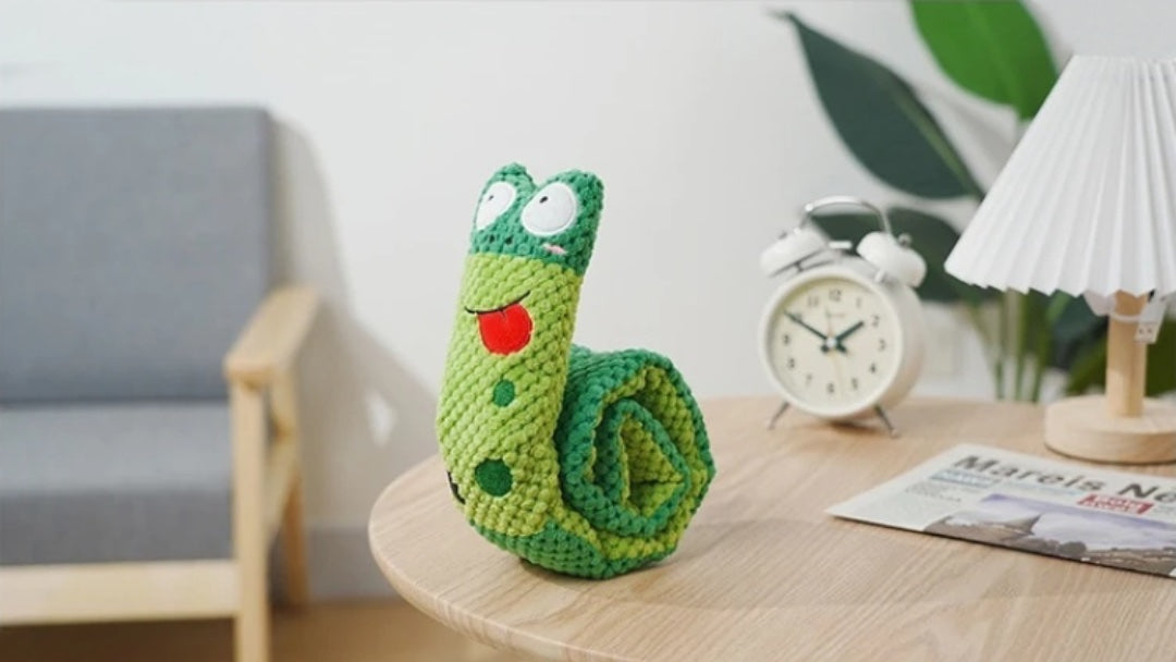 Meet the Squeaky Snail: The 2-in-1 Chew & Treat Puzzle Toy Every Dog Needs