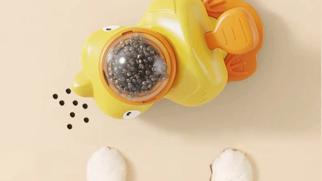 Make Mealtime Smarter & Cuter with the Yellow Duck-Shaped Interactive Treat Dispenser